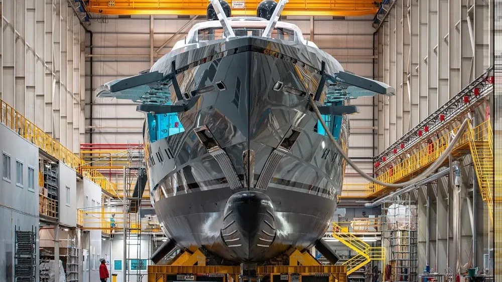 Superyacht under construction in a shipyard